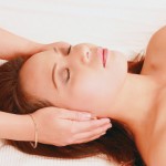 Young woman in reiki healing session